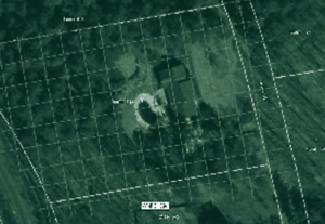 Anaerial photo with a house and a grid over it