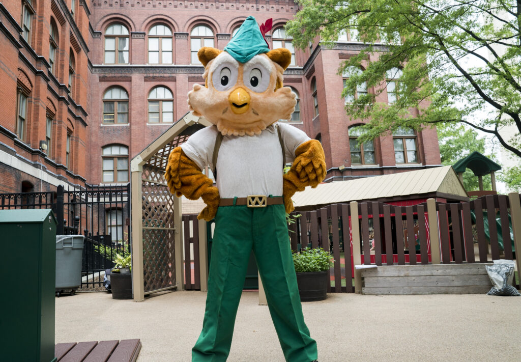A Woodsy Owl mascot