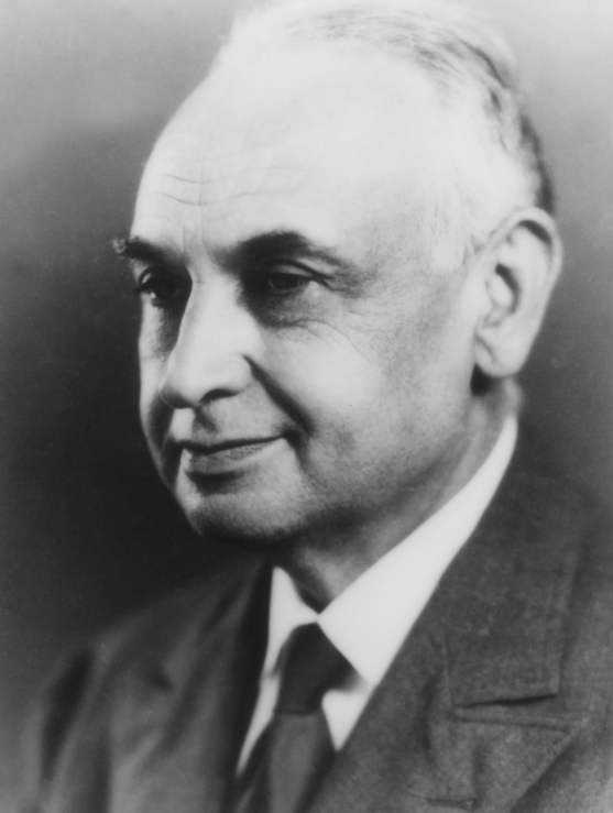 A black and white portrait of Edward Kotok