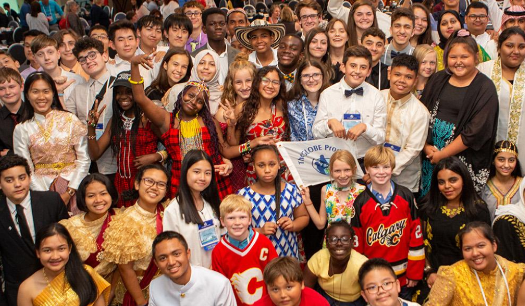 Group of children holding GLOBE flag
