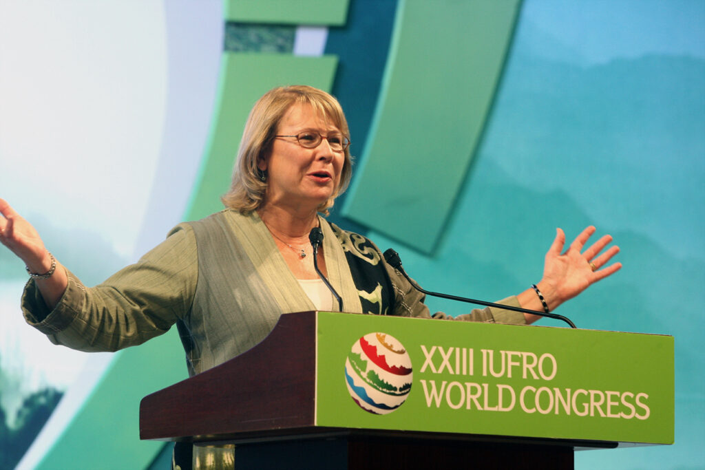 Ann Bartuska gives a speech at a podium.
