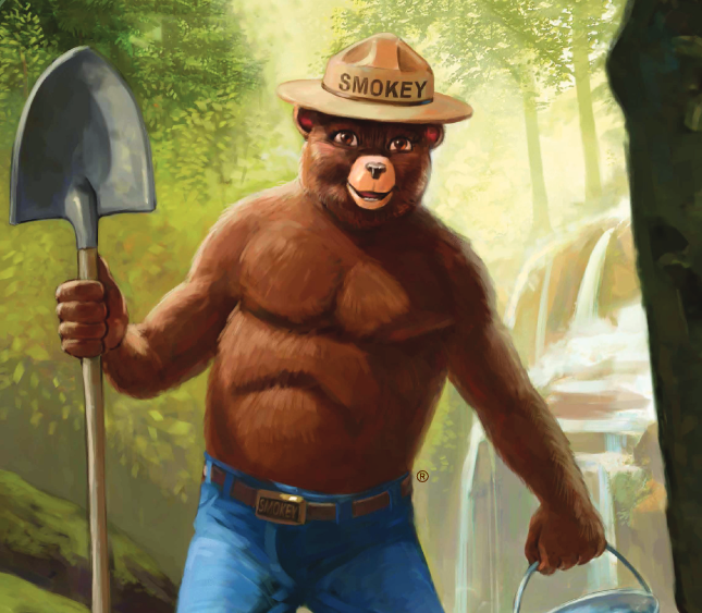 An illustrated Smokey Bear holding a shovel