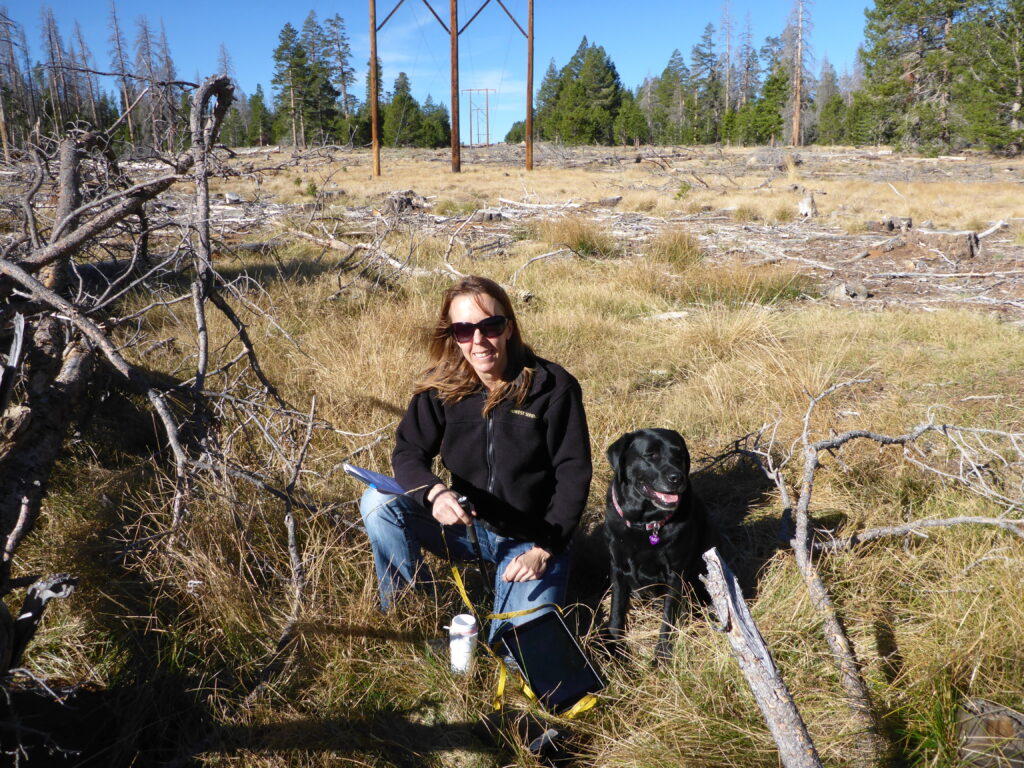 Portrait of Nicole Bringolf with a dog