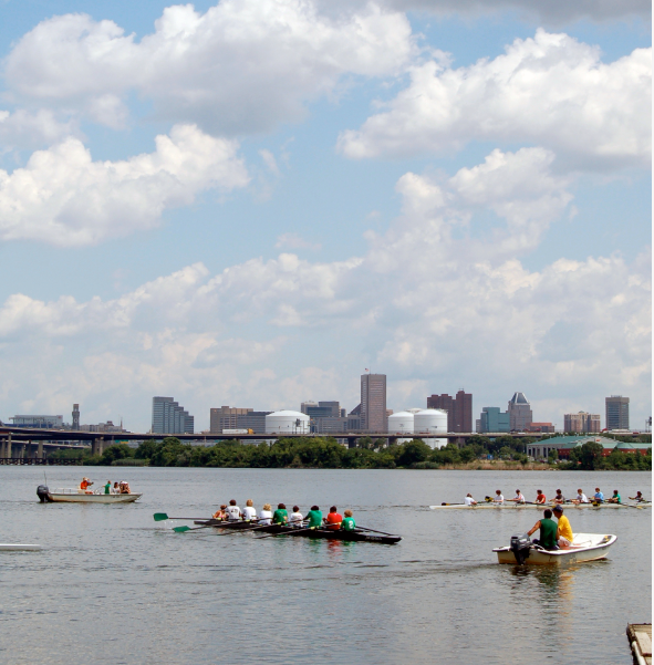 People riding boats in the Baltimore Harbor
