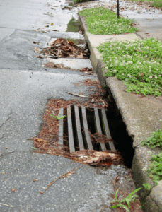A storm drain on a street