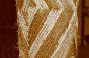 Rope braided around a pole in a diamond pattern