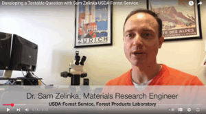 A thumbnail from a YouTube video featuring Sam Zelinka in his office