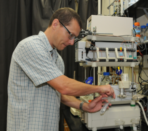 Dr. St. John works in a lab