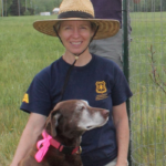 Amy Hill outside with her dog