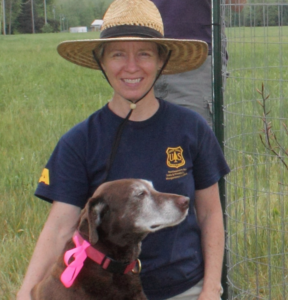 Amy Hill outside with her dog
