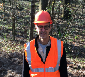 Carl Trettin in protective gear in the forest