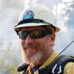 Portrait of Kyle Cannon in a hard hat