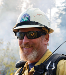 Portrait of Kyle Cannon in a hard hat