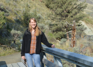 Louise Loudermilk standing on a bridge outside