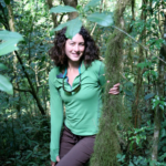 A portrait of Sarah Wiener in the forest