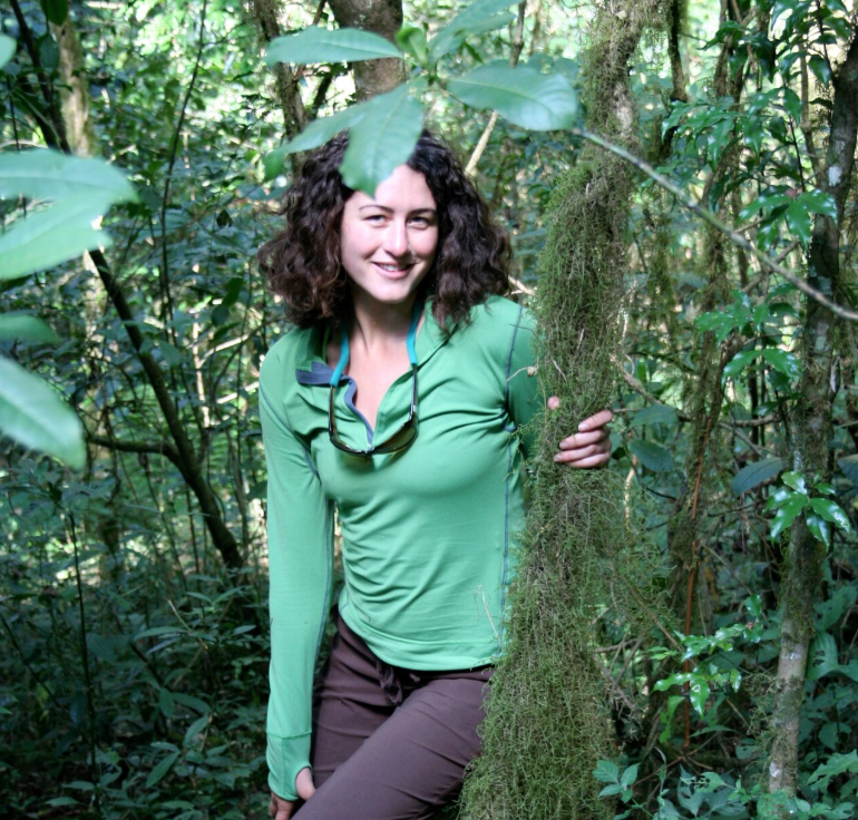 A portrait of Sarah Wiener in the forest