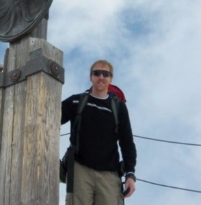 Portrait of Travis Warziniack outside